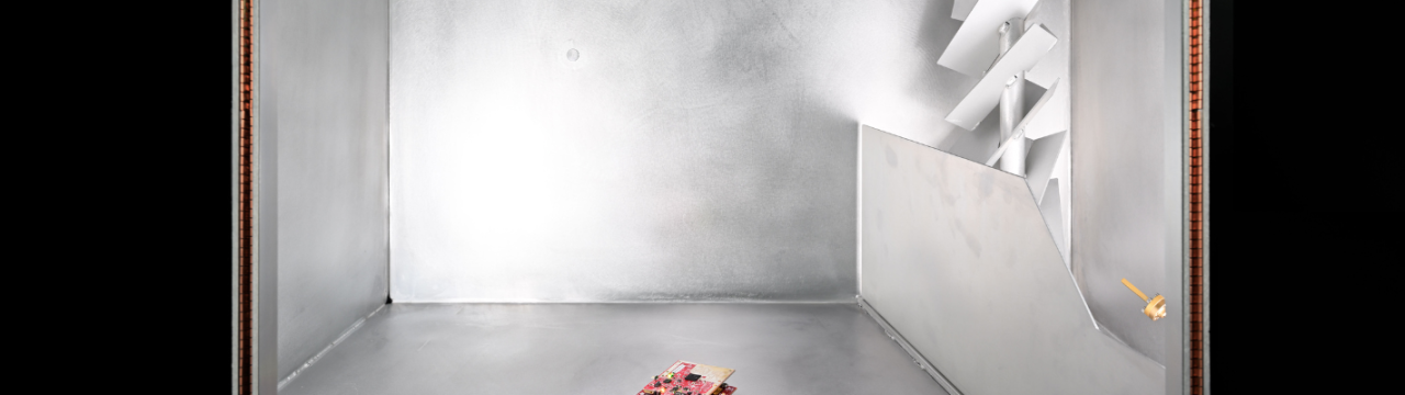 Tx/Rx Isolation Measurements of FMCW Radar using a Reverberation Chamber